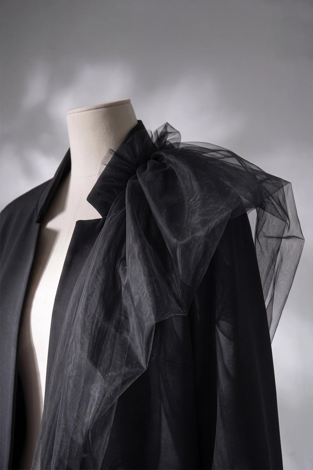 BATU LIGHTWEIGHT OVERSIZED BLACK JACKET WITH TULLE DETAIL ON ONE SHOULDER